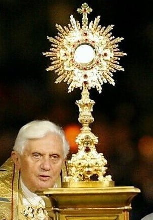 POPE BENEDICT XVI ON CORPUS CHRISTI. The Eucharist, a call to holiness and self-giving. 2