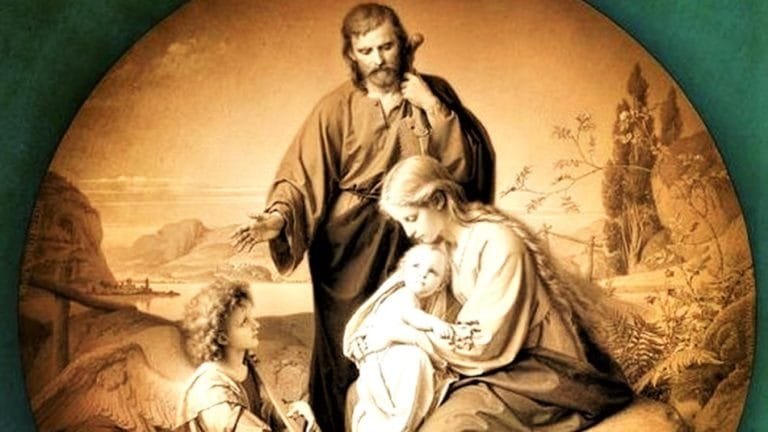 a man and woman holding a child