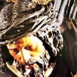 a statue of a man with a crown