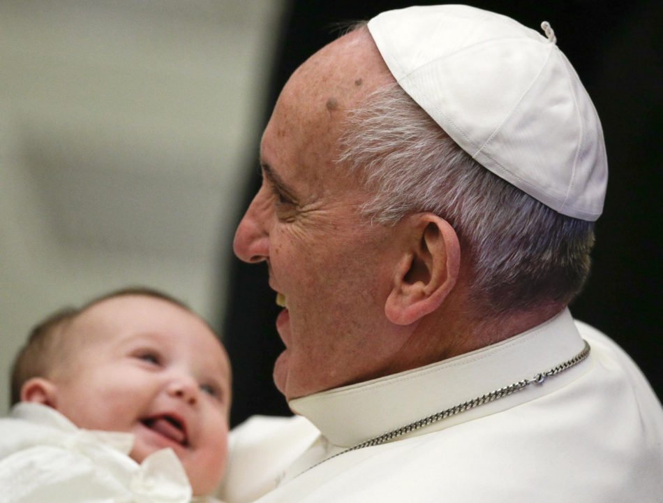 Pope FRancis with a baby