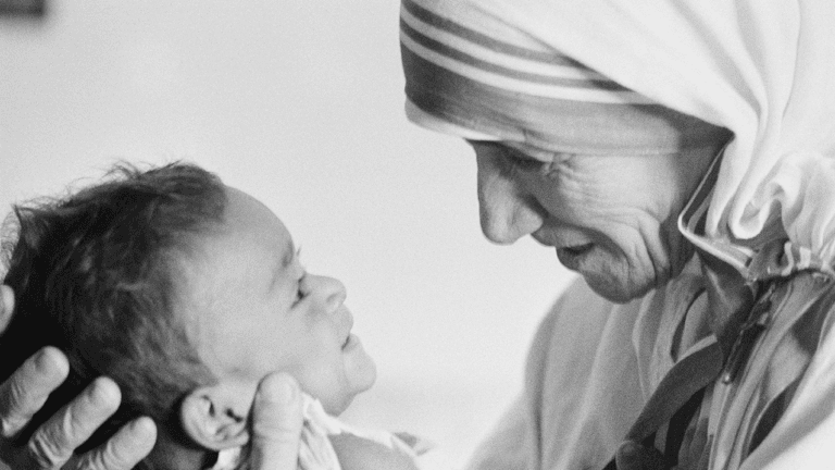 SMILE AND BE KIND EVEN IF YOU DON'T FEEL LIKE IT AND YOU'LL SHOW GOD'S KINDNESS TO OTHERS! 9 St. Teresa of Calcutta smiling to a baby