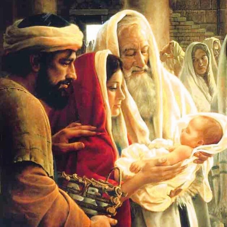 a man and woman holding a baby