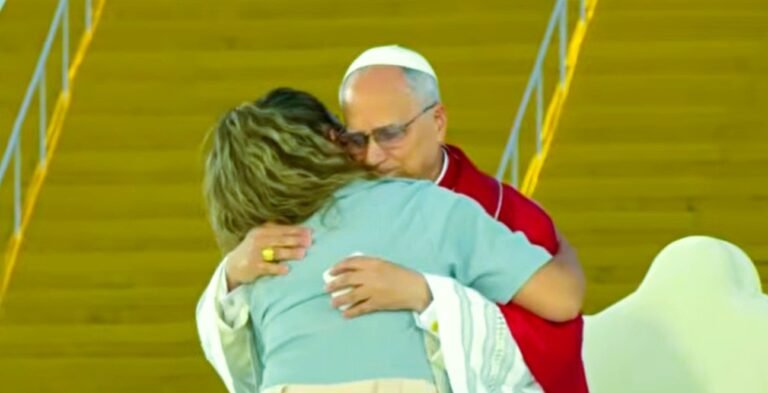 leo xiv hugs suffering woman